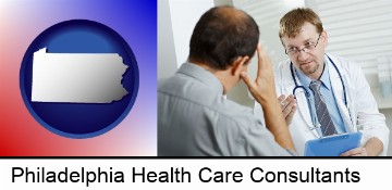 a doctor consulting with a patient about health symptoms in Philadelphia, PA